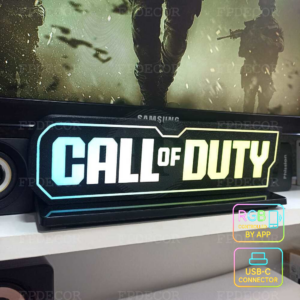 Call of Duty LED light box powered by USB-C displayed beside a professional gaming PC setup.